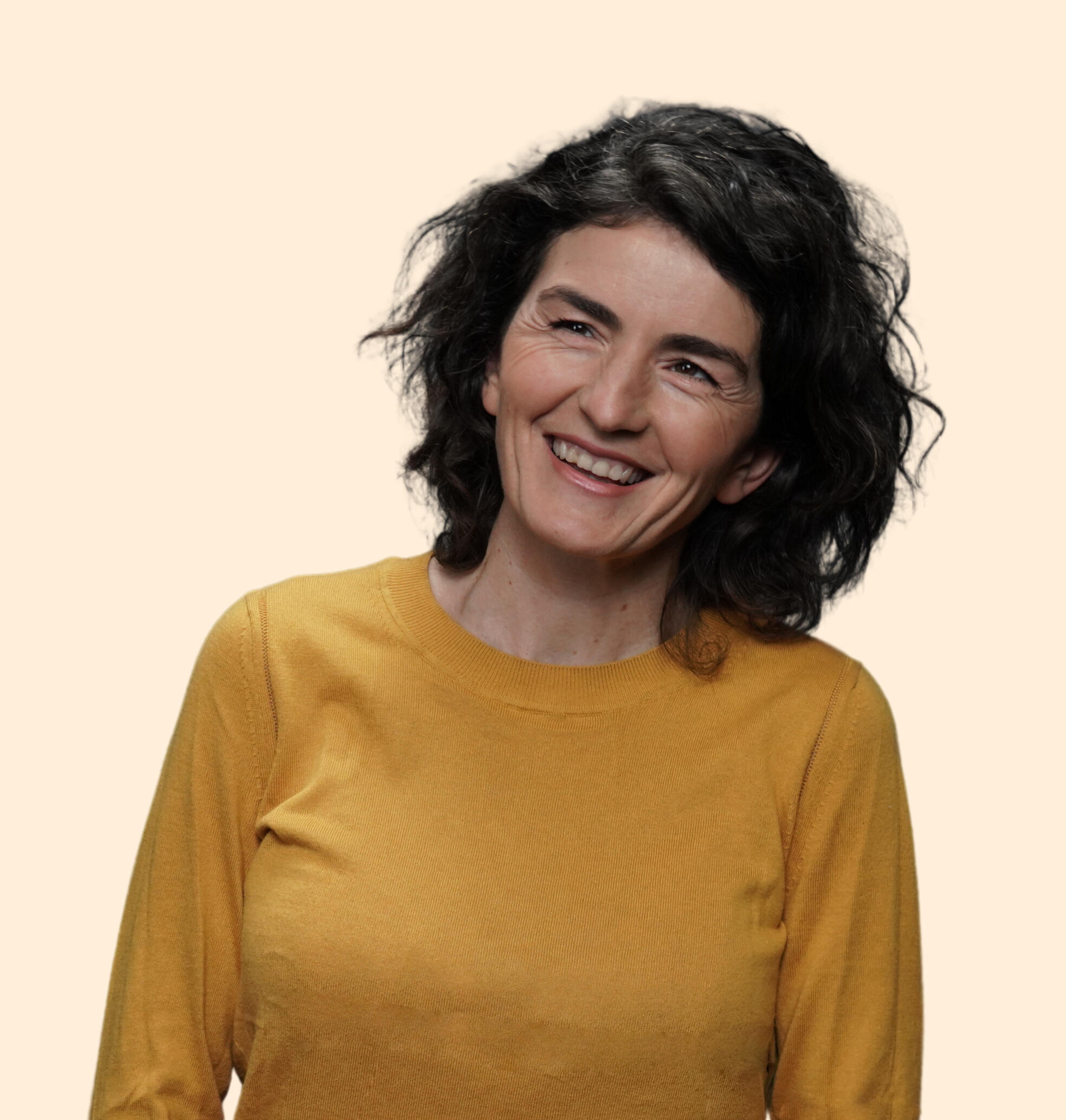 Dolores Stef portrait wearing a yellow sweater